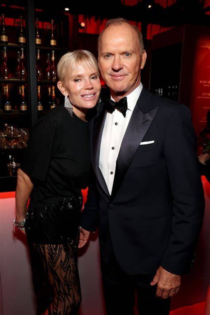 Actor Michael Keaton and wife Caroline McWilliams attending the... News