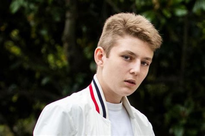 Barron Trump Has 1950s Vibes in a Bomber Jacket & an Upgraded Sneaker Style