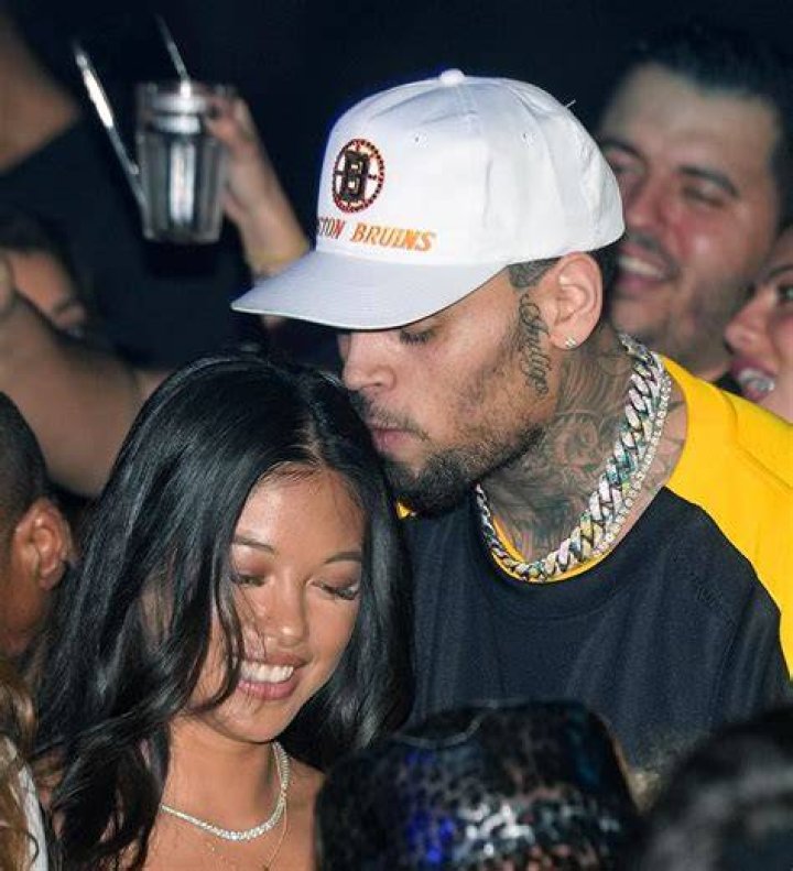 Chris Brown Cuddles Up To Baby Mama & Son In Rare Family Shot