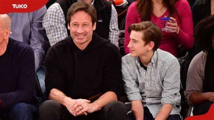 David Duchovny and son Miller Duchovny attend Knicks game at Madison
