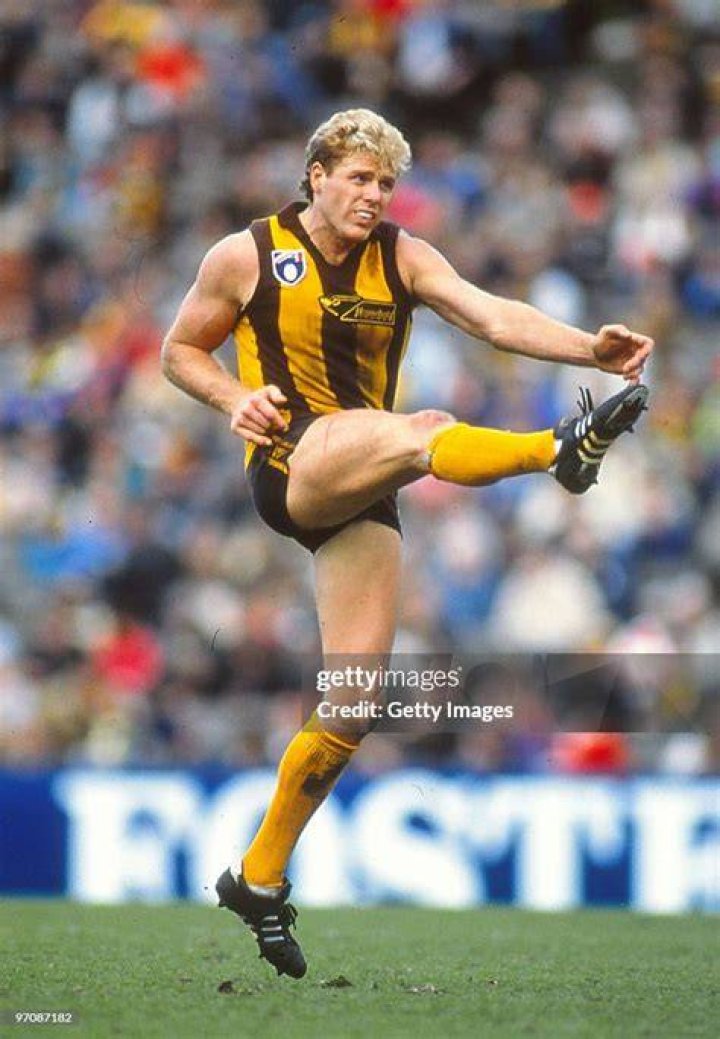 Hawthorn Hawks great Dermott Brereton and his partner arrive for the