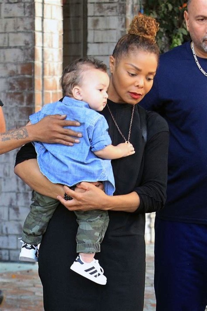 Jackson carries her baby boy Eissa in her arms after having lunch