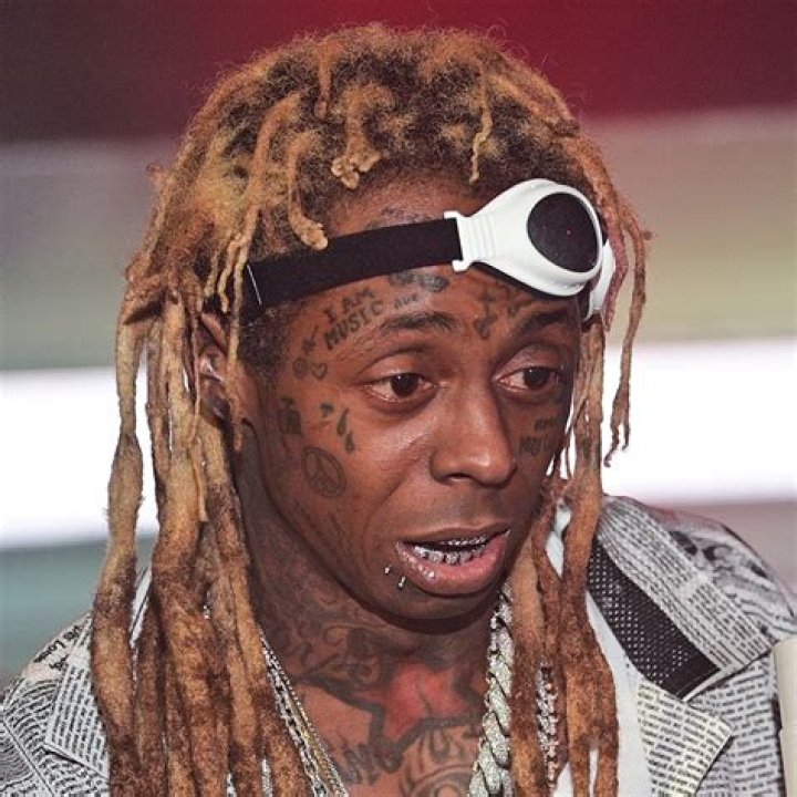 Lil Wayne and Fiancé La’Tecia Thomas Show Off Matching Tattoos